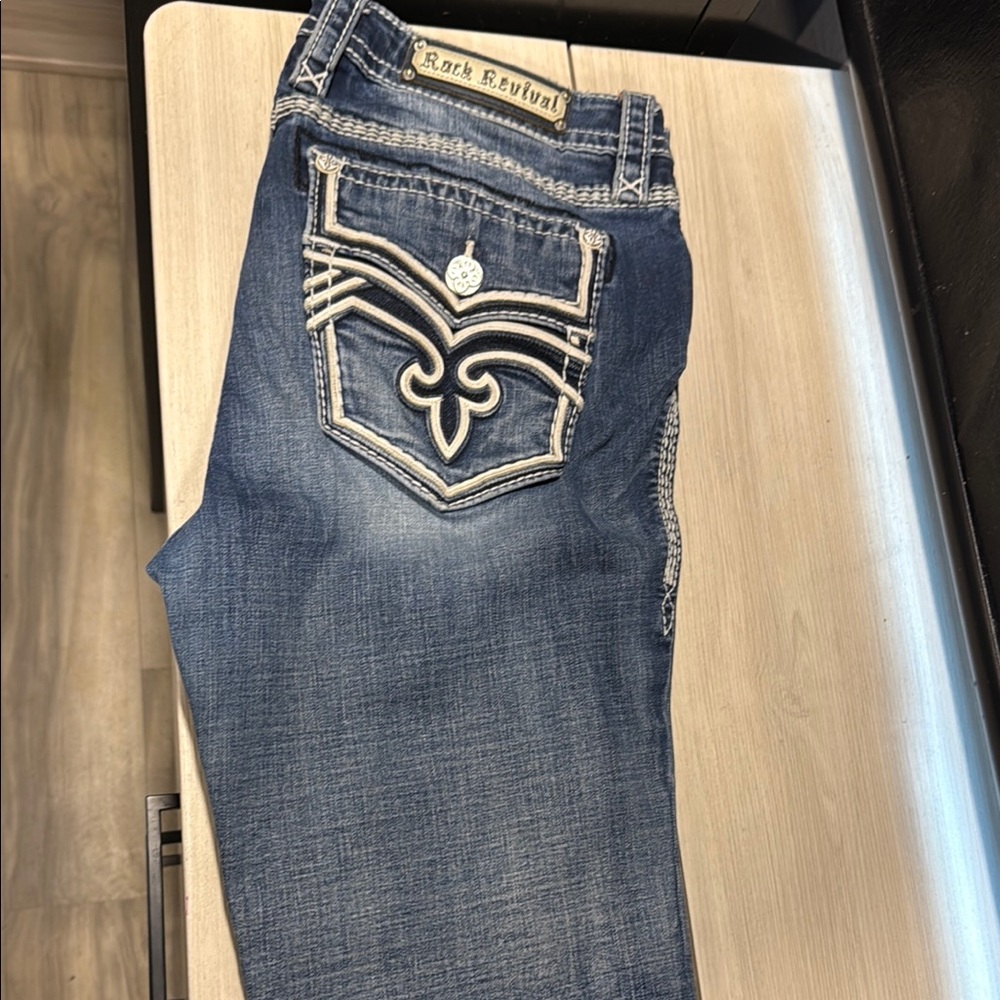Rock Revival Blue Boot Cut Jeans with Embroidered Back